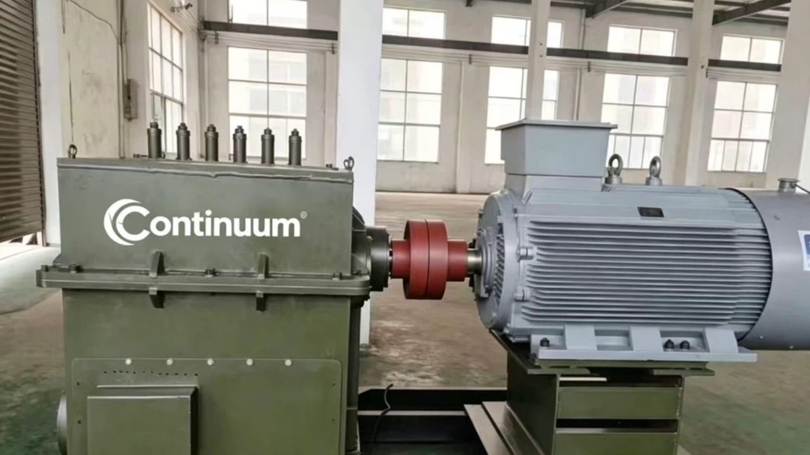 Continuum CT-Series permanent magnet generator unit coupled to its motor on the factory floor.